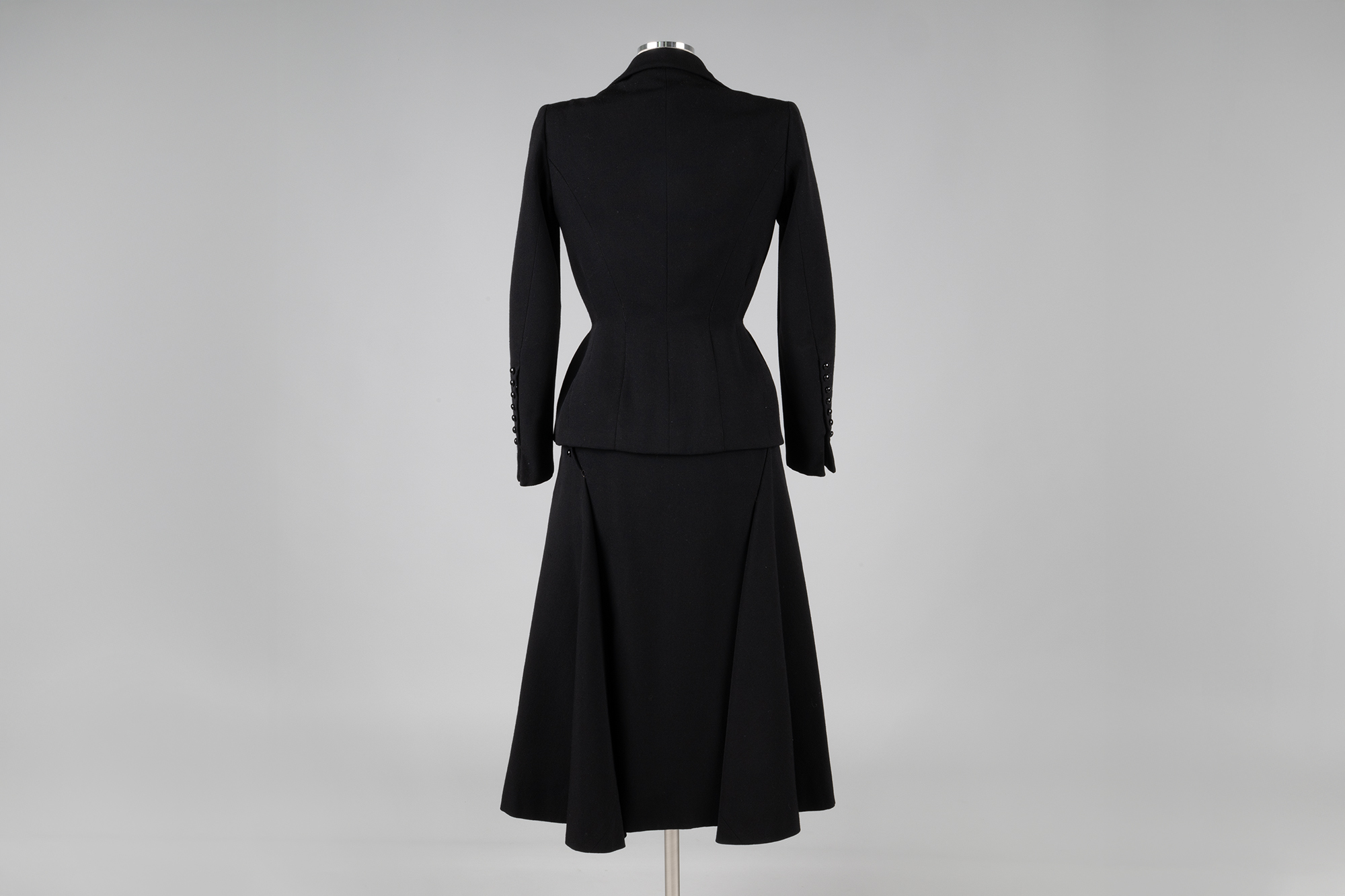 Image of Black faille skirt suit, 1951